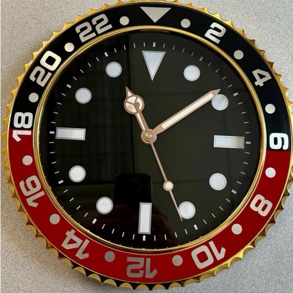 Elegant Black and Red Wall Clock with Gold Accents